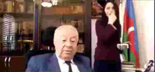 Azerbaycanlı eski milletvekili, sekreterinin kalçasına dokunurken kameraya yakalandı