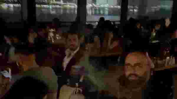 Yasak saatte Cihangir'de otel terasındaki Boğaz keyfini polis bastı