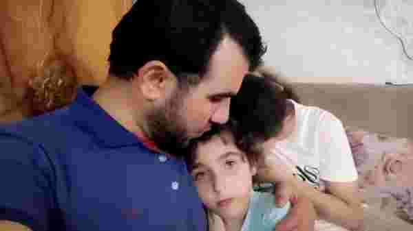 Bombalardan korkan kızlarını teselli ettiği video ile tanınan Gazzeli baba, hayatını kaybetti