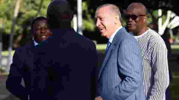 Erdoğan, kahkaha attığı fotoğrafın perde arkasını anlattı: Eski futbolcu Weah ile bir espri üzerine gülümsedik