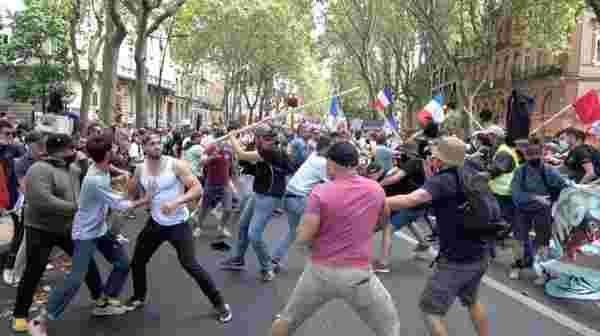 Fransa'da aşı karşıtları sokaklara döküldü! Siviller, protestoculara tepki gösterince ortalık savaş alanına döndü