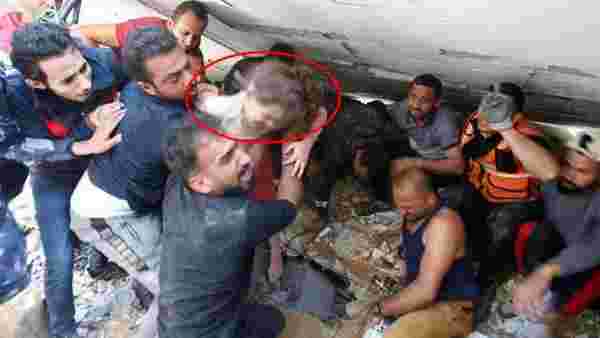 İsrail'in bombaları evini yıktı, Filistinli küçük kız 7 saatin ardından enkazdan böyle çıkarıldı