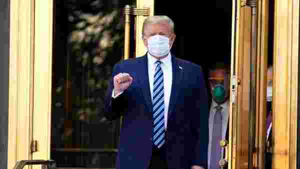 Koronavirüs tedavisi gördüğü hastaneden taburcu edilen Trump, Beyaz Saray'a girer girmez maskesini çıkardı