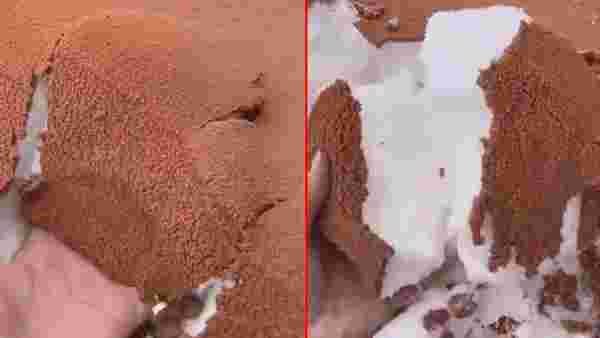 Suudi Arabistan'da şaşkına çeviren görüntü: Karın üzeri kumla kaplandı, koca çöl çikolatalı pastaya döndü