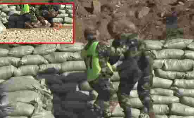 Çin'de talim yapan askeri polis adayı el bombasını elinden düşürdü! Ölümden döndüler