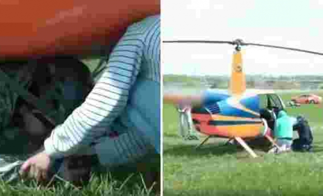 Dünyanın Adana'sı Rusya'dan İlginç Olay: Arkadaşını Helikopterin Altına Bantlayıp Uçtu