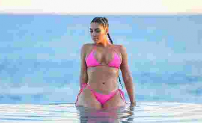 Kim Kardashian geri döndü! Bikinili pozları nefes kesti