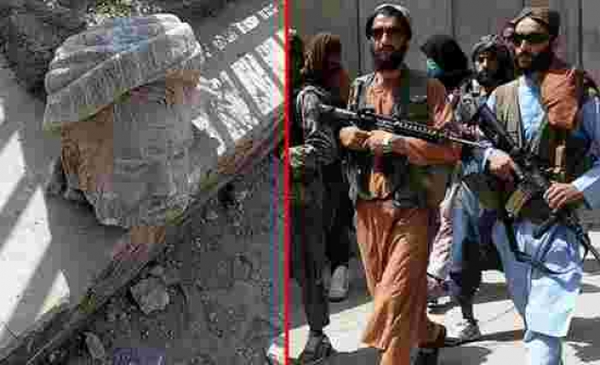 'Kimseden intikam almayacağız' diyen Taliban militanları, yıllar önce öldürdükleri siyasi liderin heykelini yıktı