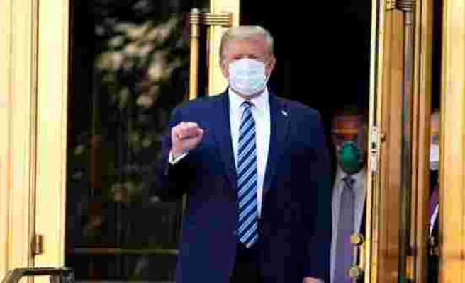 Koronavirüs tedavisi gördüğü hastaneden taburcu edilen Trump, Beyaz Saray'a girer girmez maskesini çıkardı