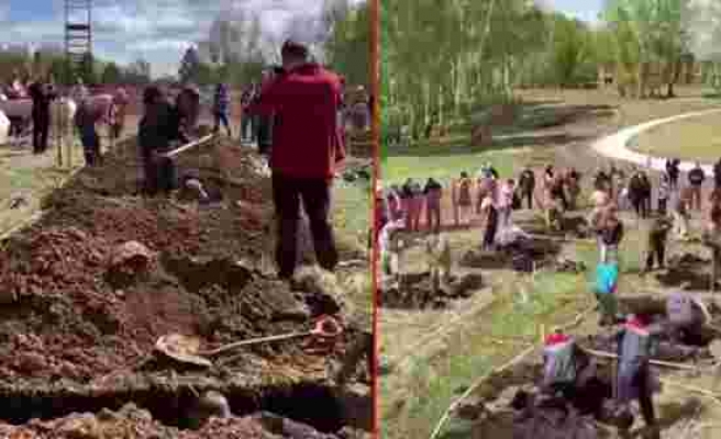 Koronayla mücadele eden Rusya'da tepki çeken olay! 'Hızlı mezar kazma' yarışması düzenlediler