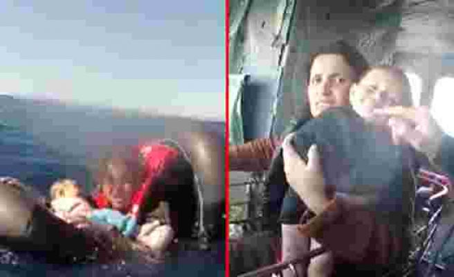 Kucağında bebeği ile denizde mahsur kalan kadını sahil güvenlik kurtardı - Haberler