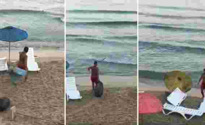 Kuşadası'nda Plajdaki Eşyalara Zarar Verip Denize Çöp Atan Maganda Gözaltına Alındı