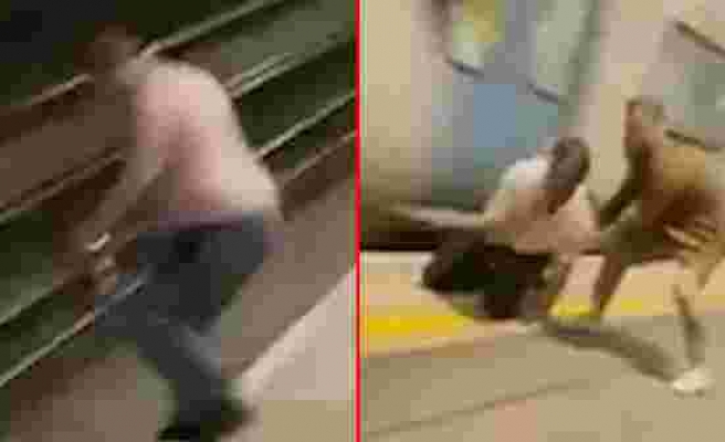 Metrodakiler nefeslerini tutarak izledi! Raylara atlayan adam, saliselerle trenin altında kalmaktan kurtuldu