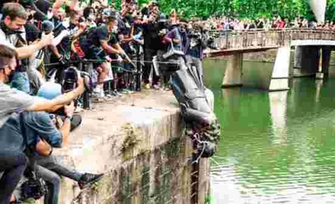 Protestocular 125 takvim köle taciri heykelini nehre atınca İçişleri Bakanı karşı çıktı