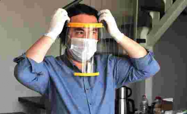 Sağlıkçıların corona virüsünden korunması için ‘siper maske’ yaptı