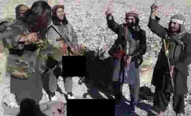 Taliban’ın infazı tüyler ürpertti Askerin başını kesip kutlama yaptılar
