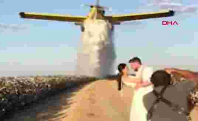 Üzerlerine Su Boşaltıldı: Düğün Fotoğrafı için Yangın Söndürme Uçağı Kullanan Çift