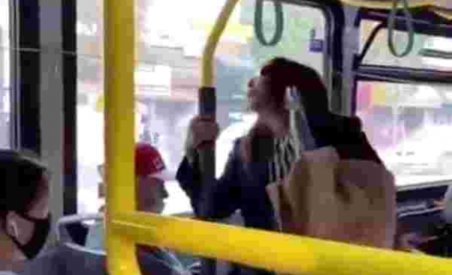 Yüzüne tüküren kadını iterek otobüsten attı